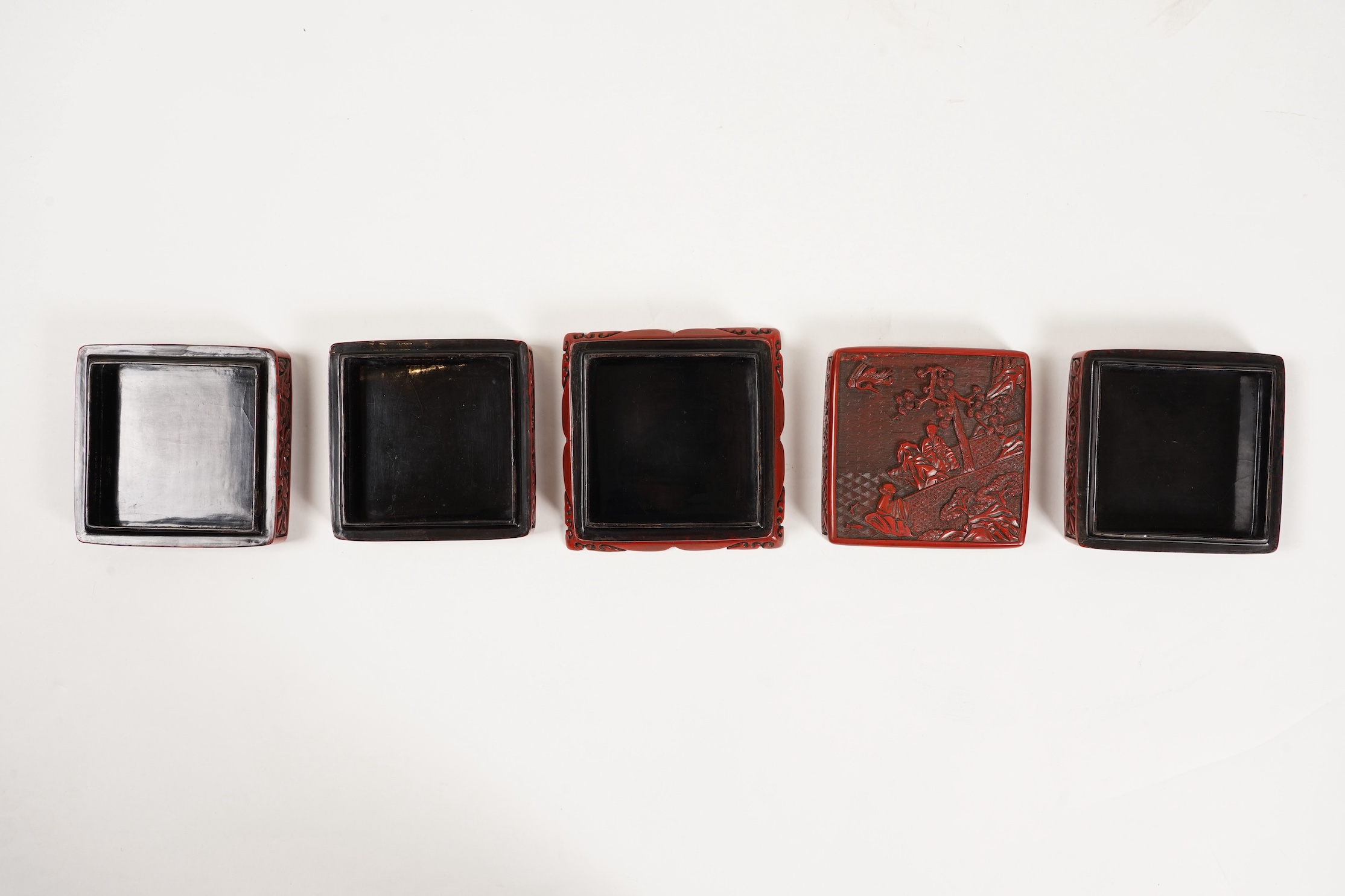 A Chinese Ming cinnabar lacquer four tier box, 15th century
